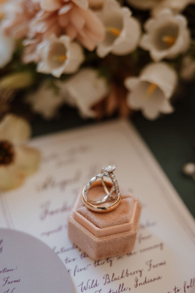 wedding rings in box with wedding accessories 