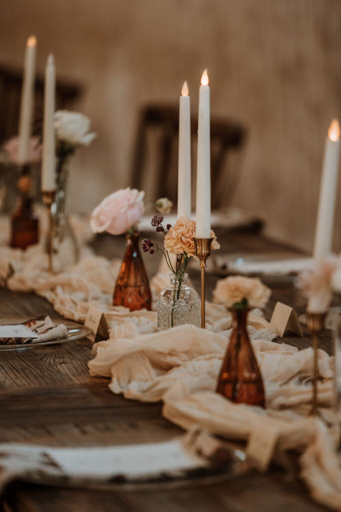 rustic wedding decor and table settings at barn wedding
