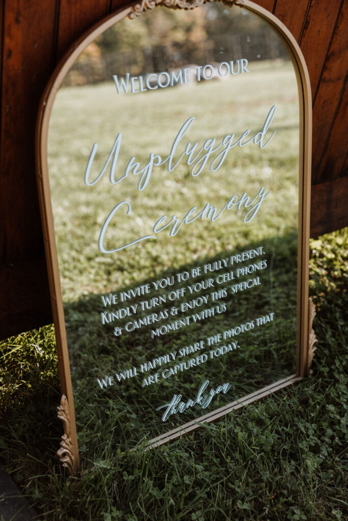 unplugged wedding mirror sign
