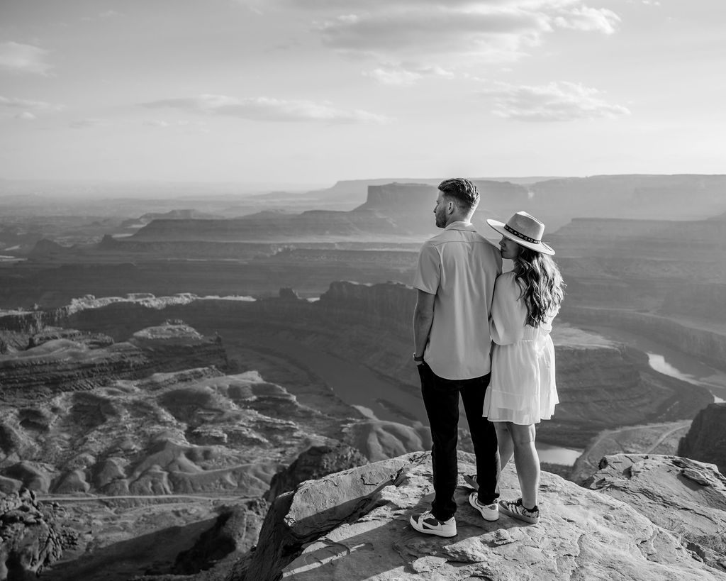 couple posing at Dead Horse Point Moab engagement