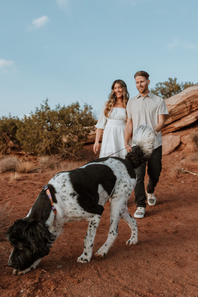 couple walks dog at Dead Horse Point 