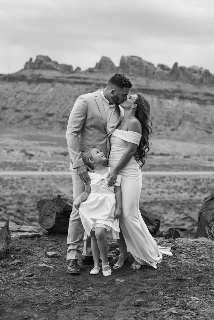 family portrait in front of rocky landscape 