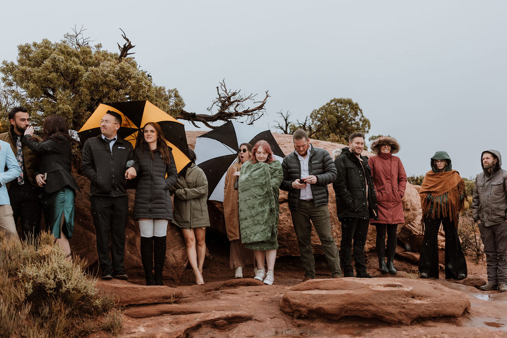 family and friends watching wedding in moab