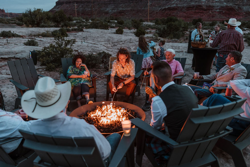 guests sitting around firepit under canvas moab