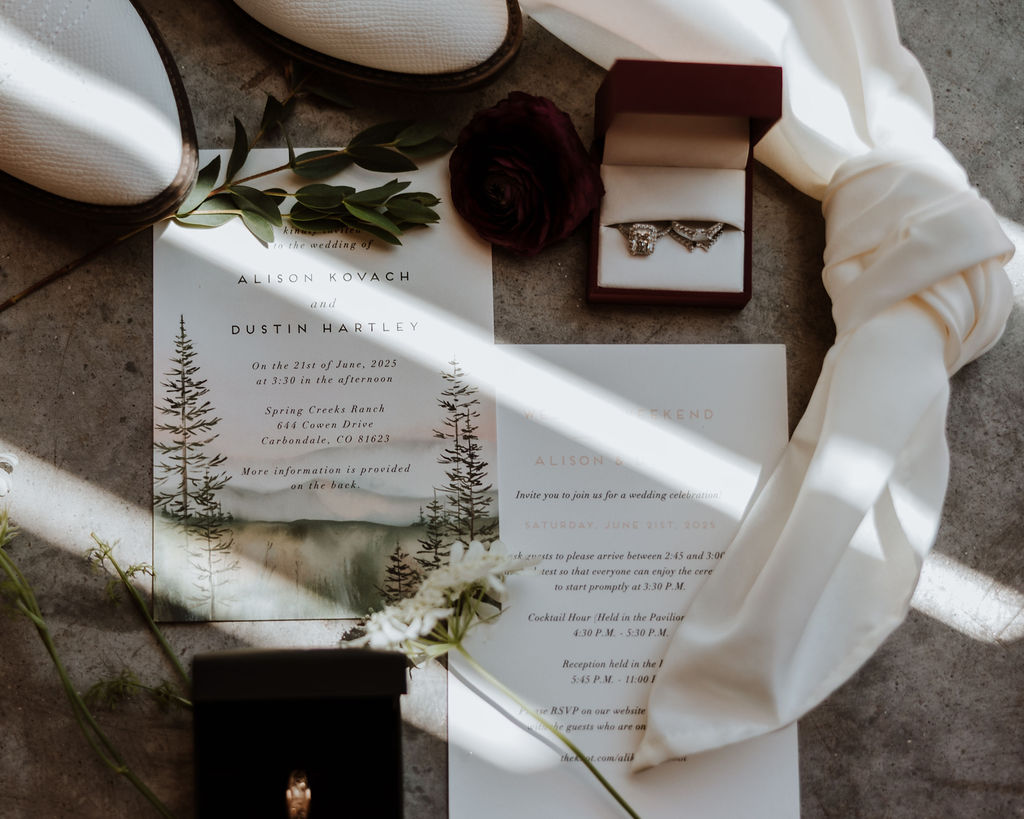 wedding details including rings and invitations