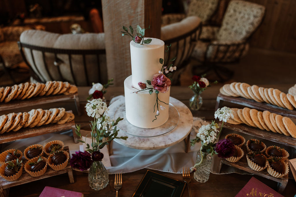 desert table featuring wedding cake