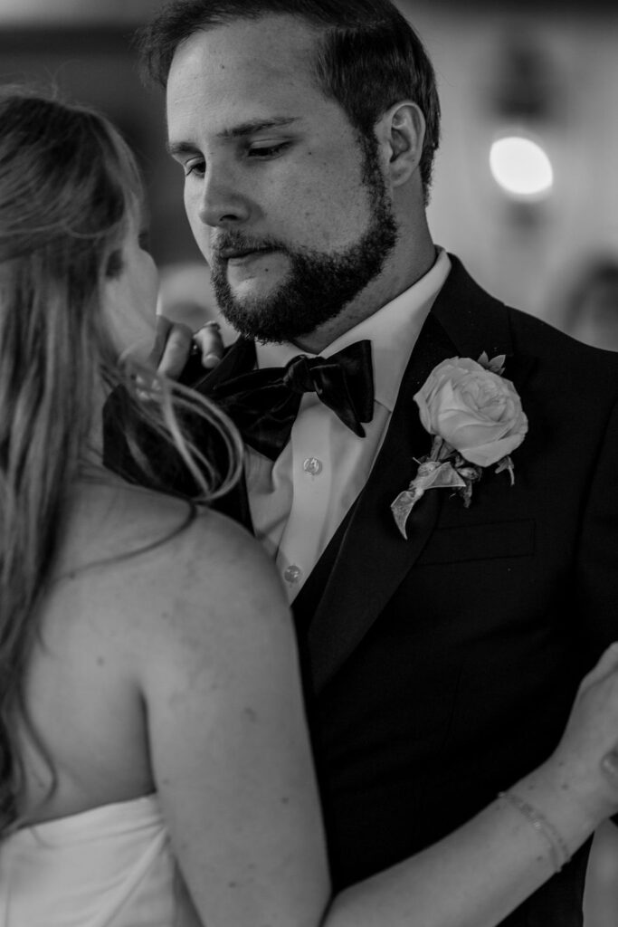 bride and groom dance together 