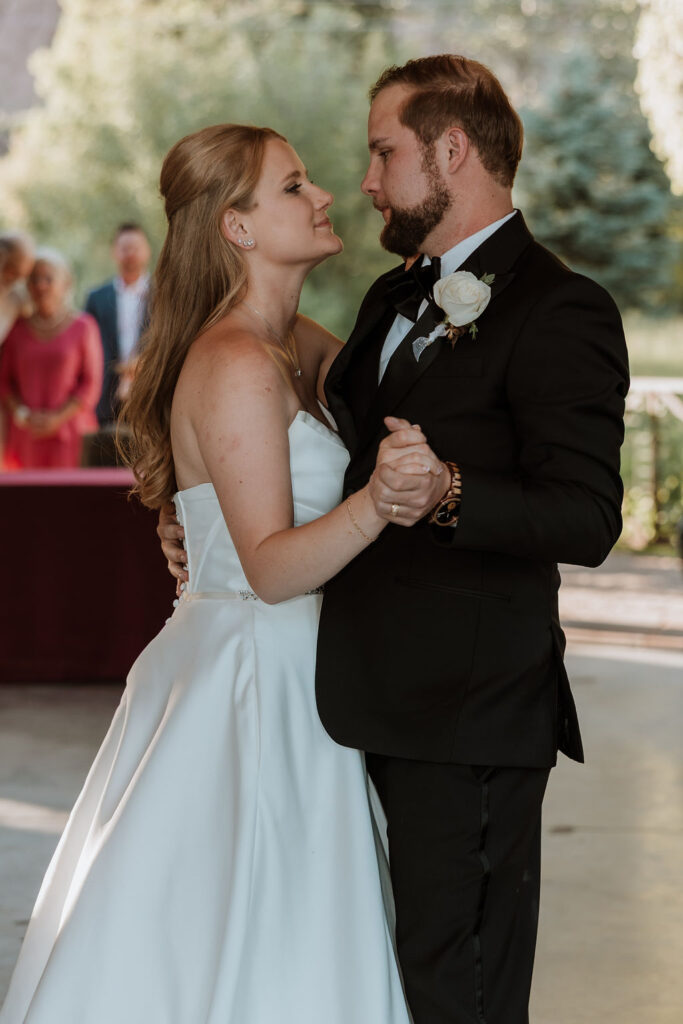 bride and groom do first dance