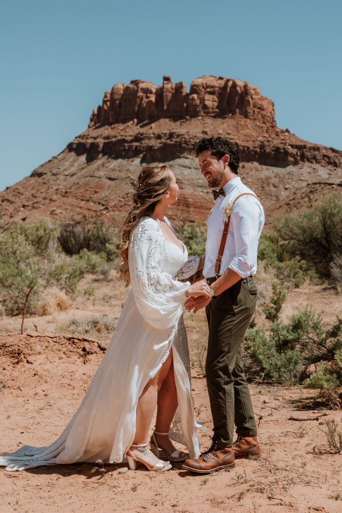 couple turn and face each other after doing wedding first look