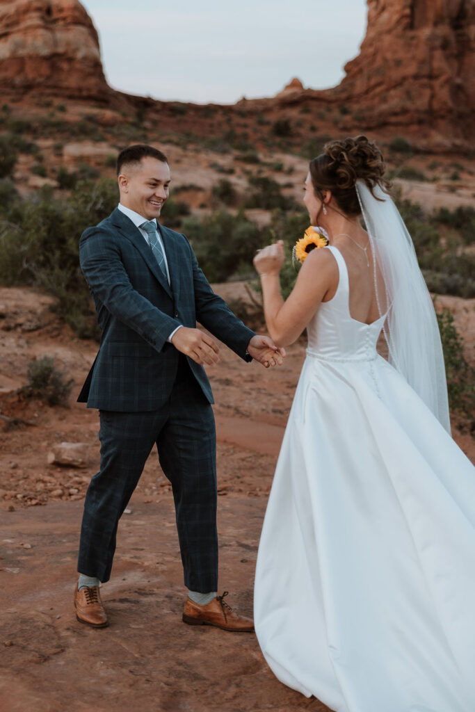 groom excited to see bride during wedding first look